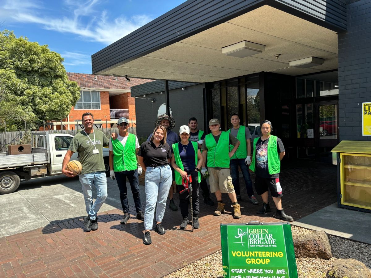 The broader Green Collar team standing together.