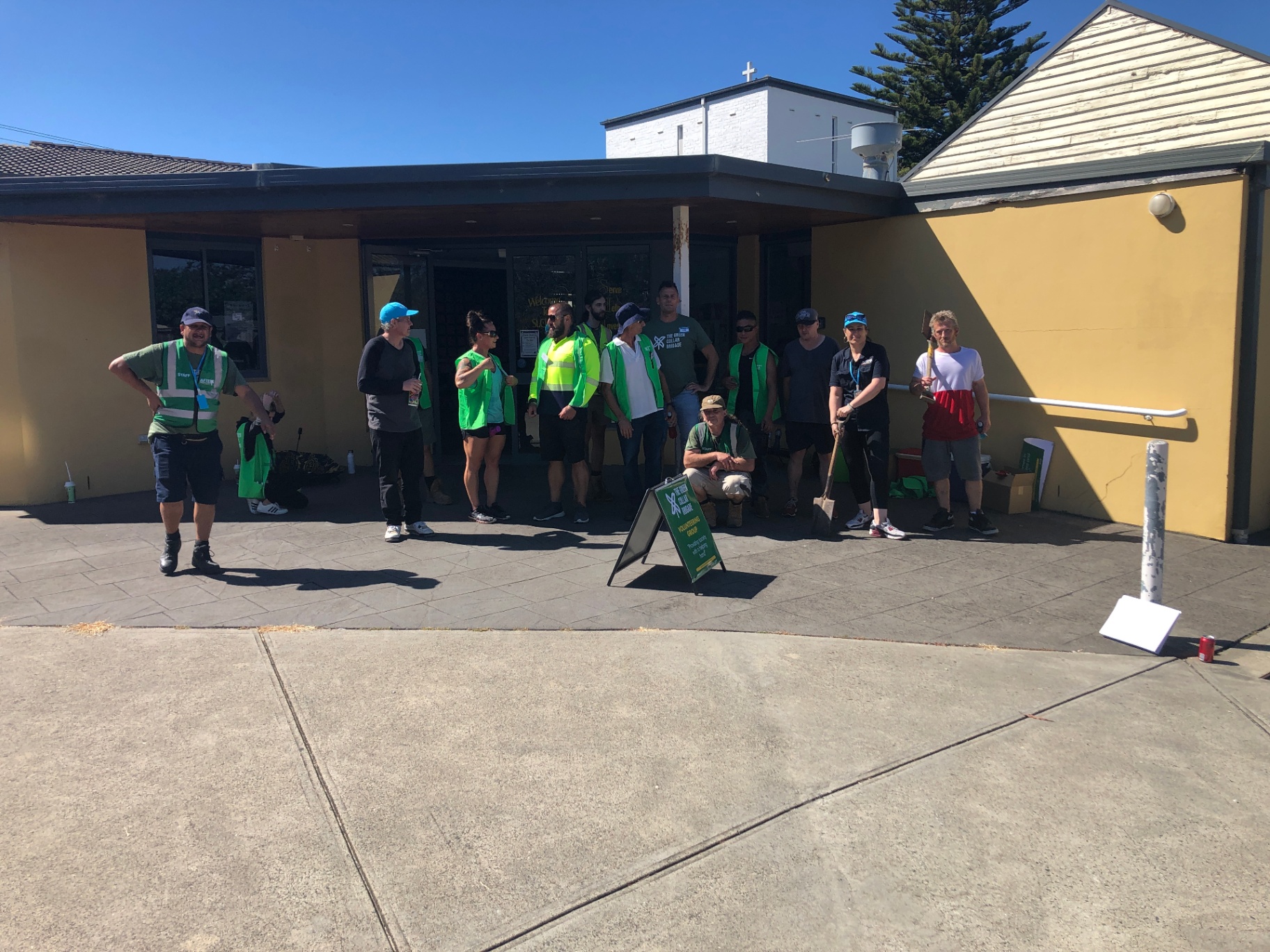 Large Brigade volunteering group outside a community church