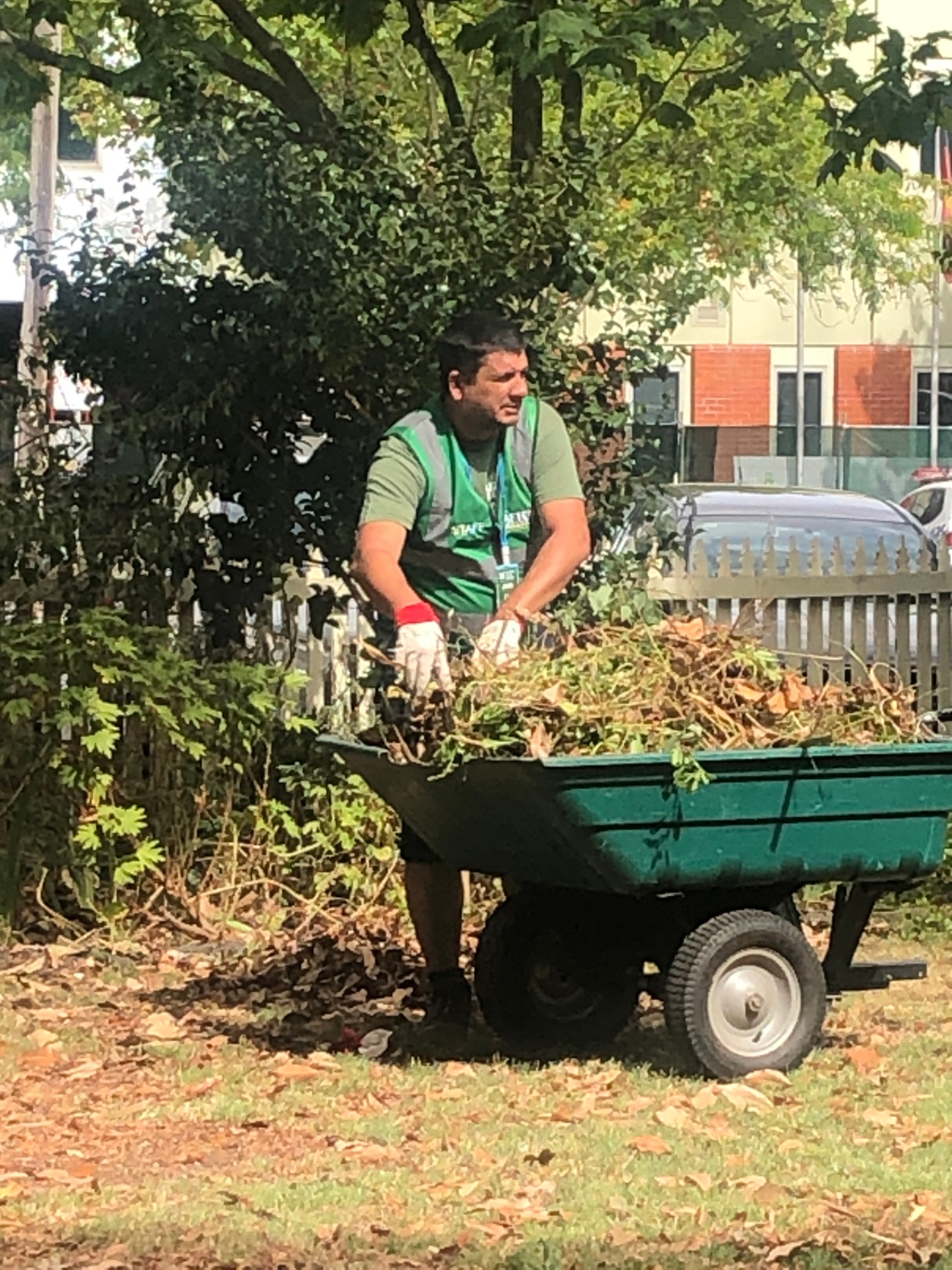 The Green Collar Brigade volunteers clearing a community garden