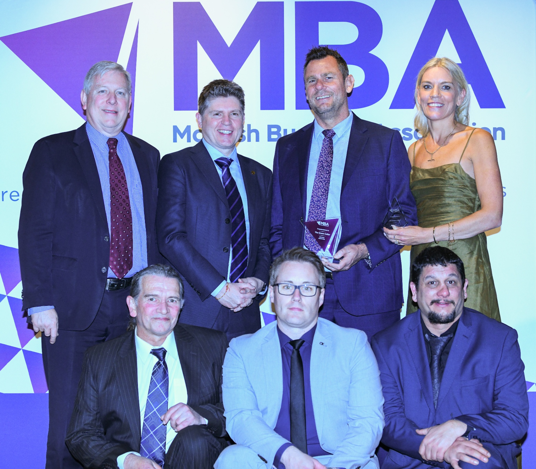 The Green Collar team on stage at the Monash Business Awards